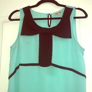 Mint/Black Sleeveless top with bow on it